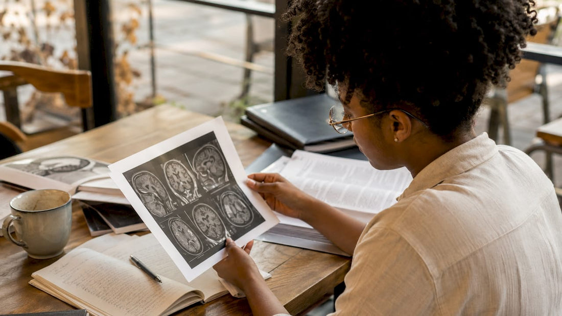 Neuroscientist examining brain scans in laboratory office