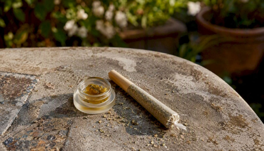 Close-up of infused cannabis pre-roll and concentrate jar